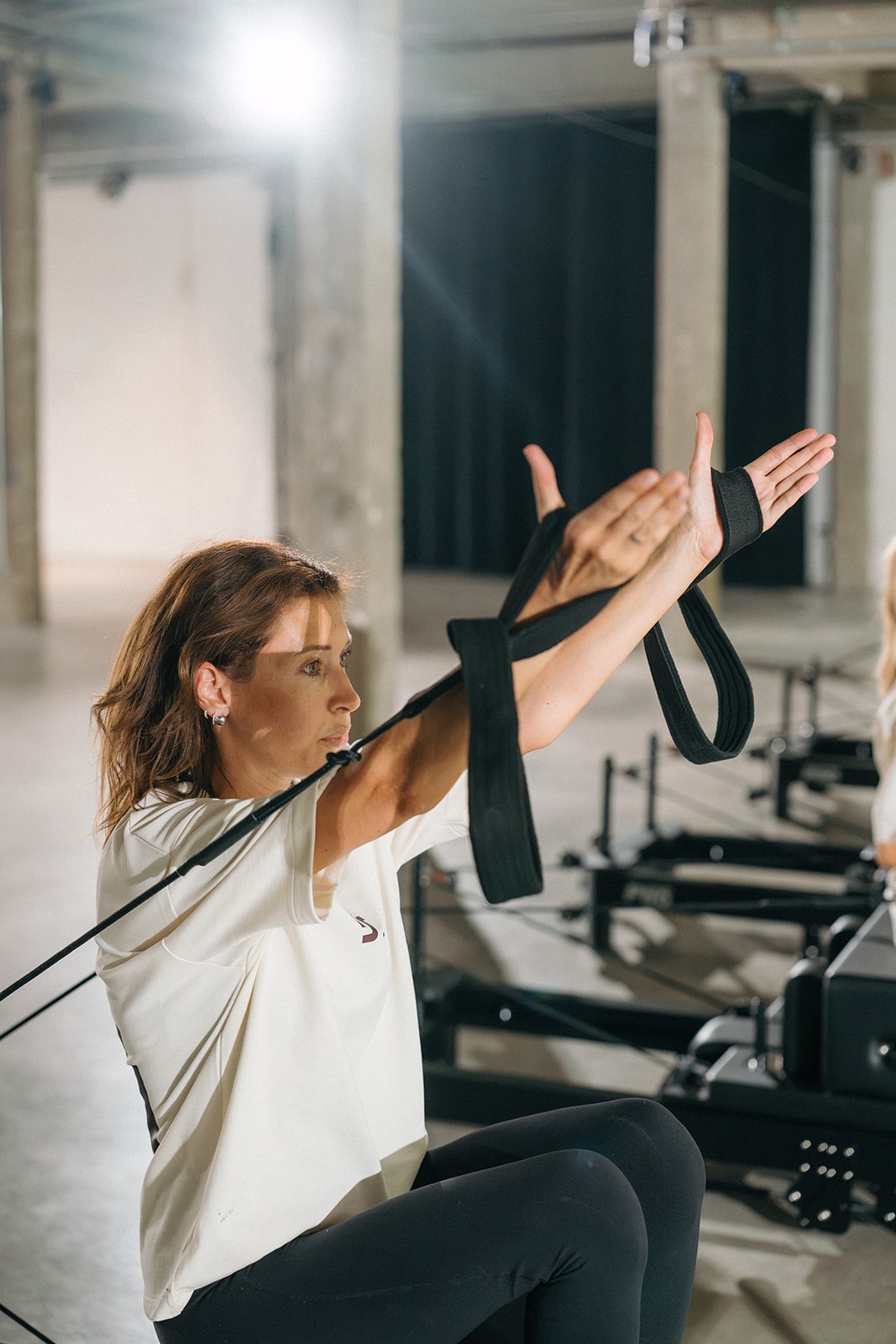 Werken met de straps op de reformer